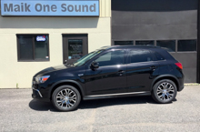 Black 2017 Mitsubishi RVR with dark automotive window film